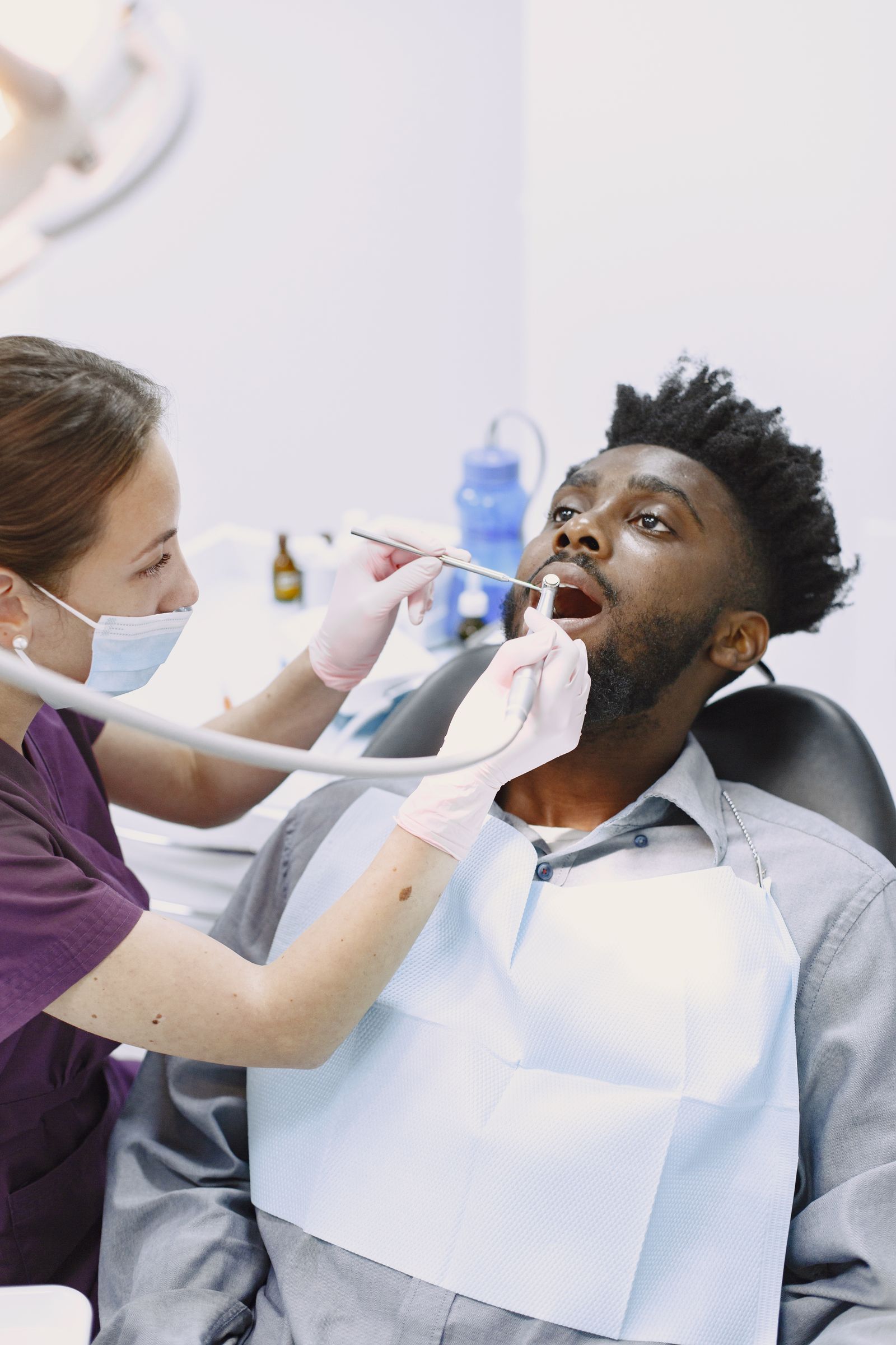 A hygienist with a patient