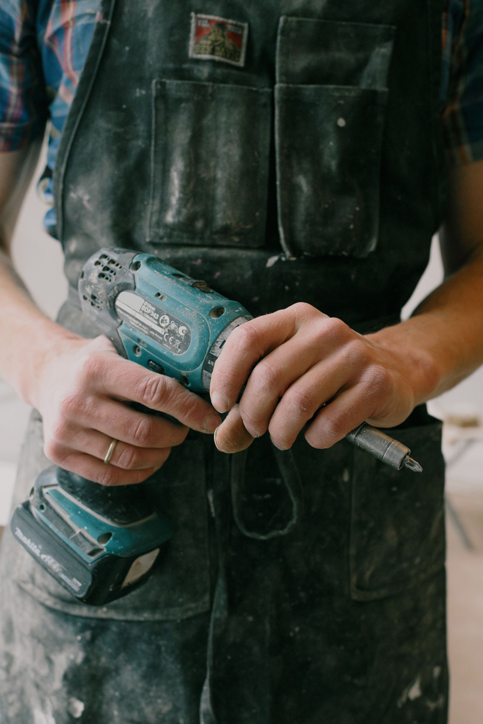 Hands at work with a drill