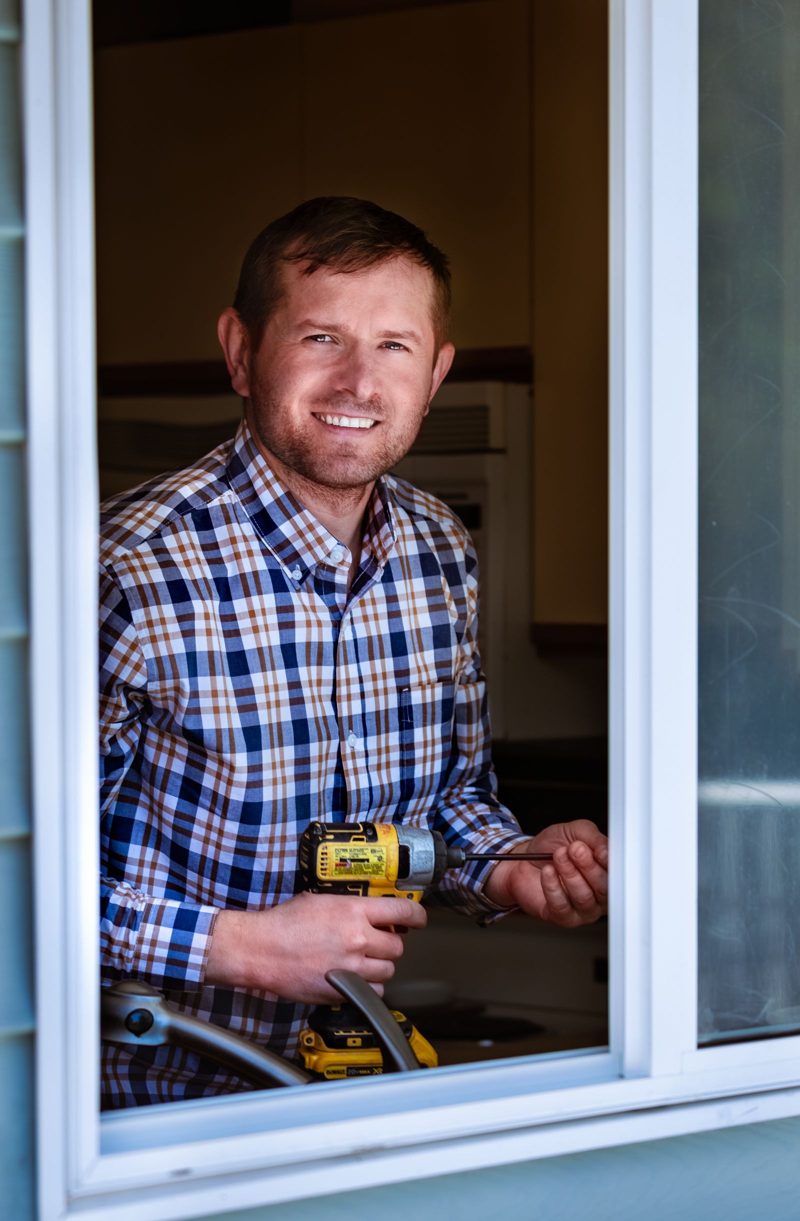 A technician at work in a customer’s home